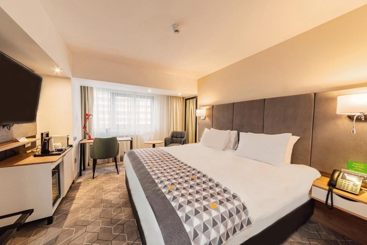 Holiday Inn Bucharest - Times, An Ihg Hotel Экстерьер фото